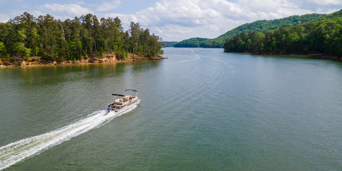1 Aerial of a Pontoon boat on a lake