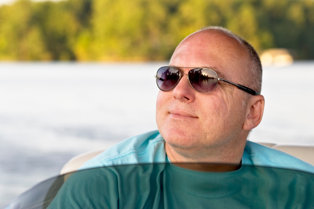 Man operating a boat
