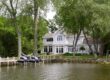 Lake house scene from the water