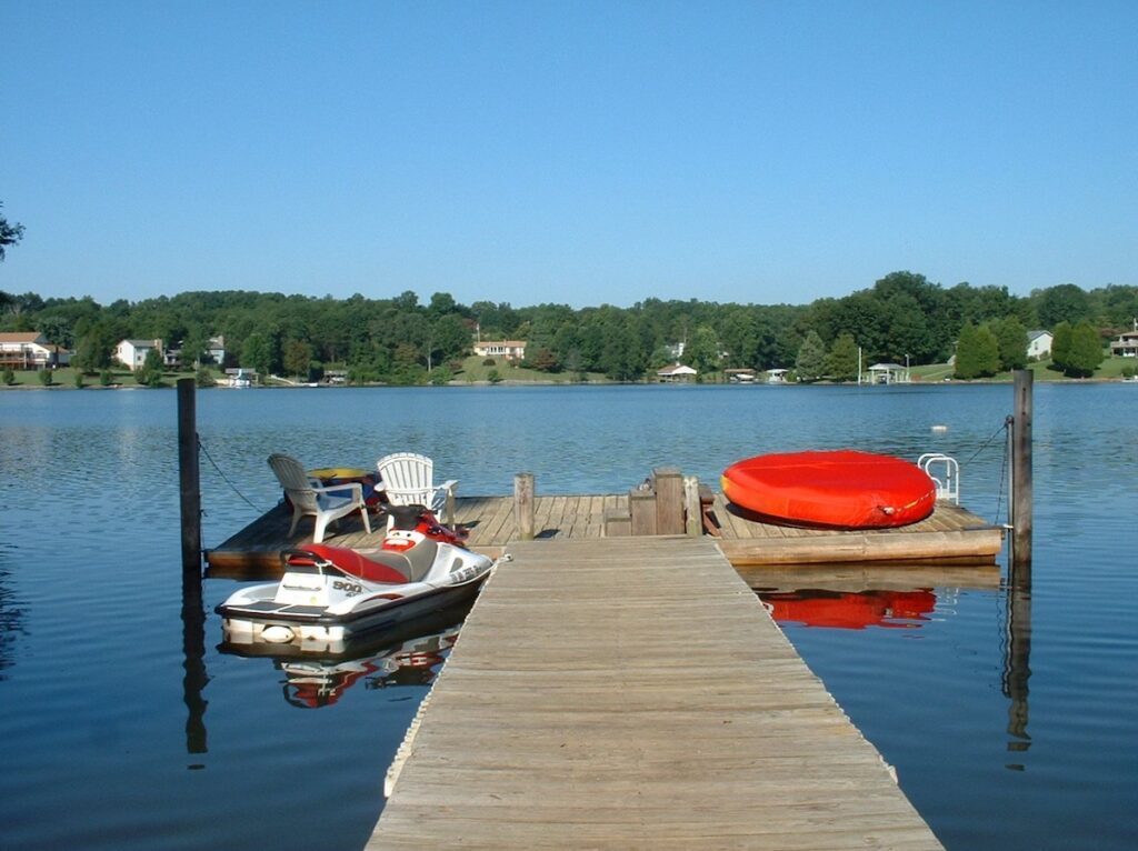Dock with personal watercraft and lake toys