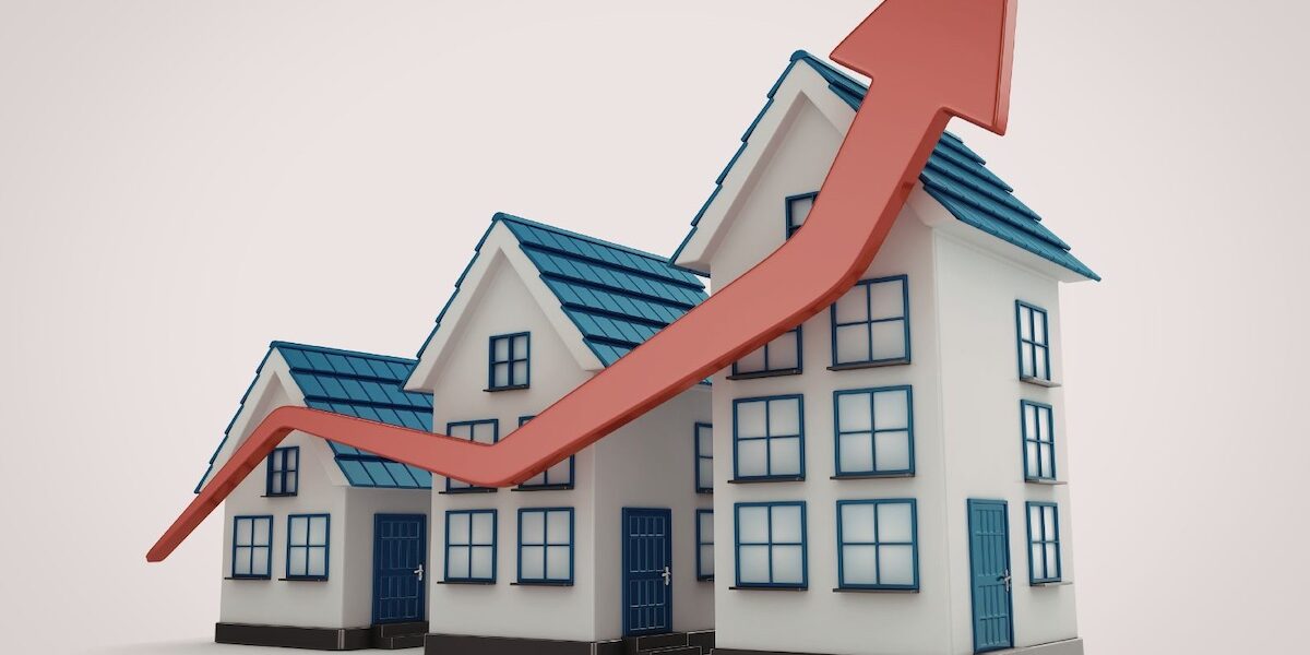 Three houses with a graph arrow going up.