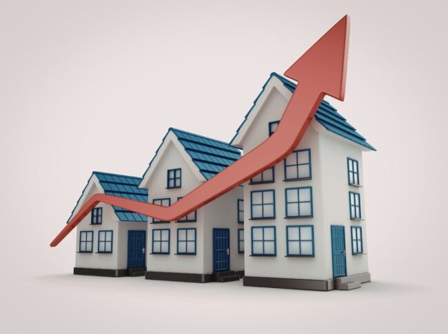 Three houses with a graph arrow going up.