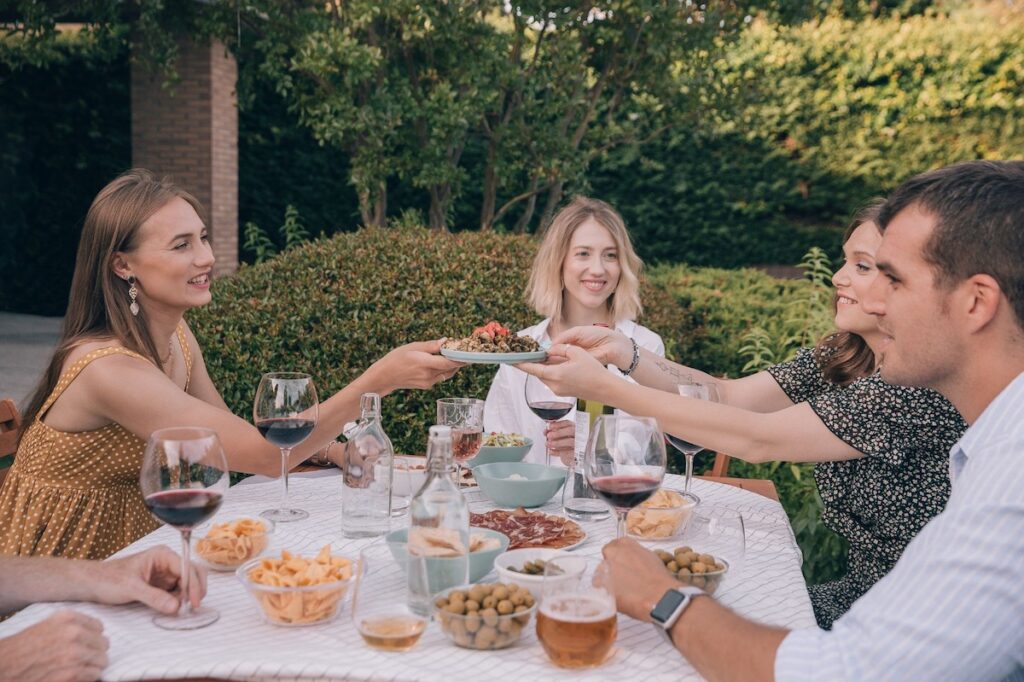 Large group eating together outside