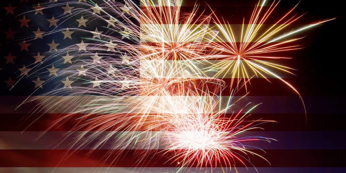 American flag with fireworks