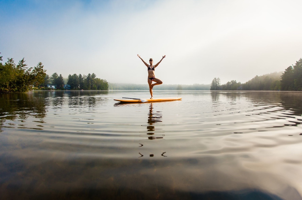 Woman doing yoga on a paddleboard