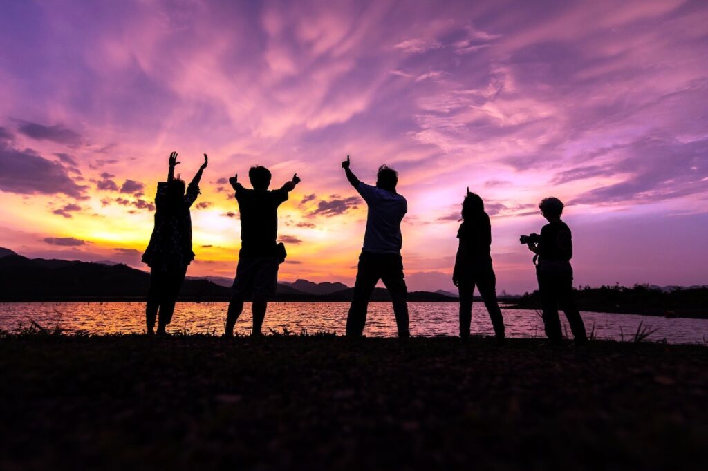 Friends watching the sunset together