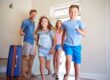 Family entering a rental home