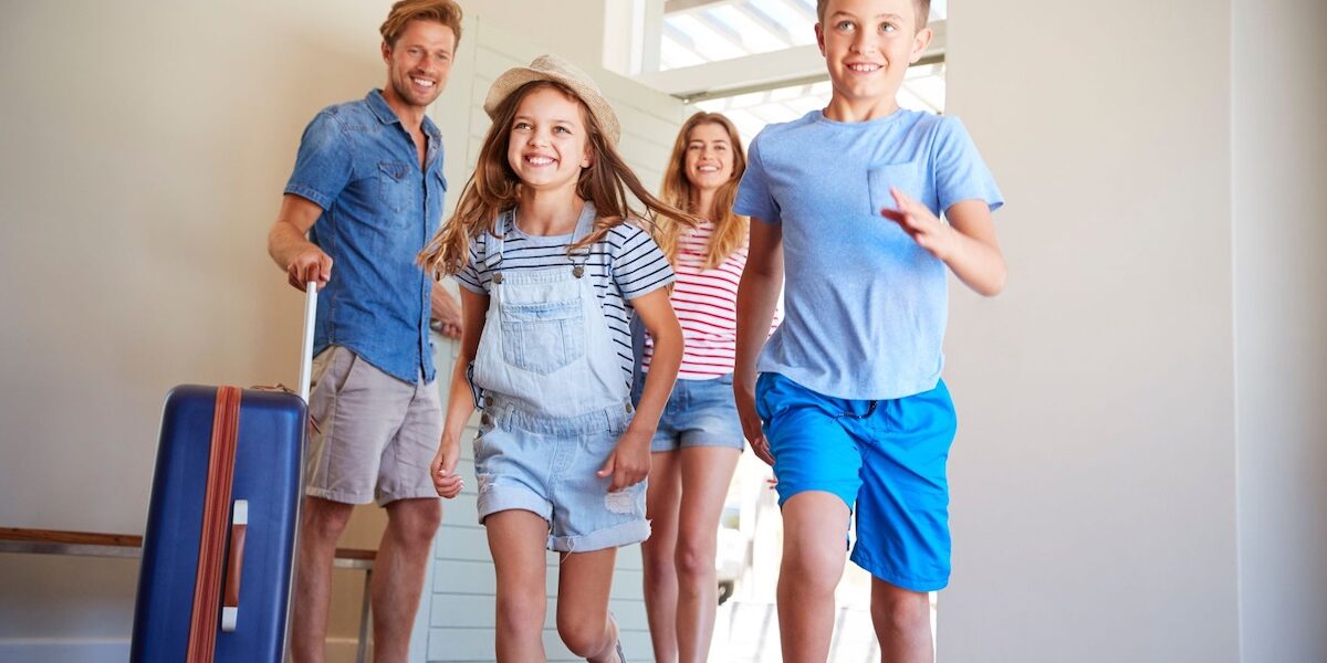 Untitled design – 2 Family entering a rental home